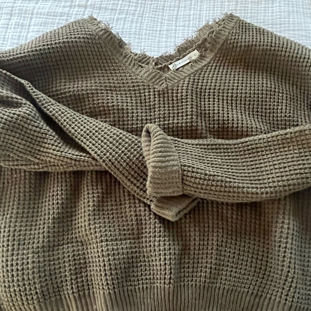 Boutique distressed sweater